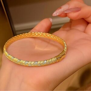 Elegant Gold and Silver Braided Bracelet